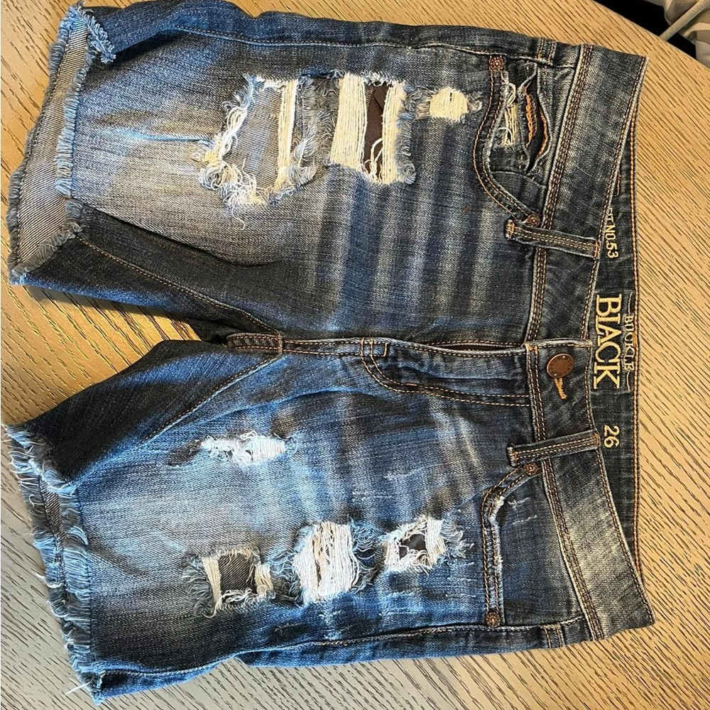 Buckle Black Distressed Jean Shorts